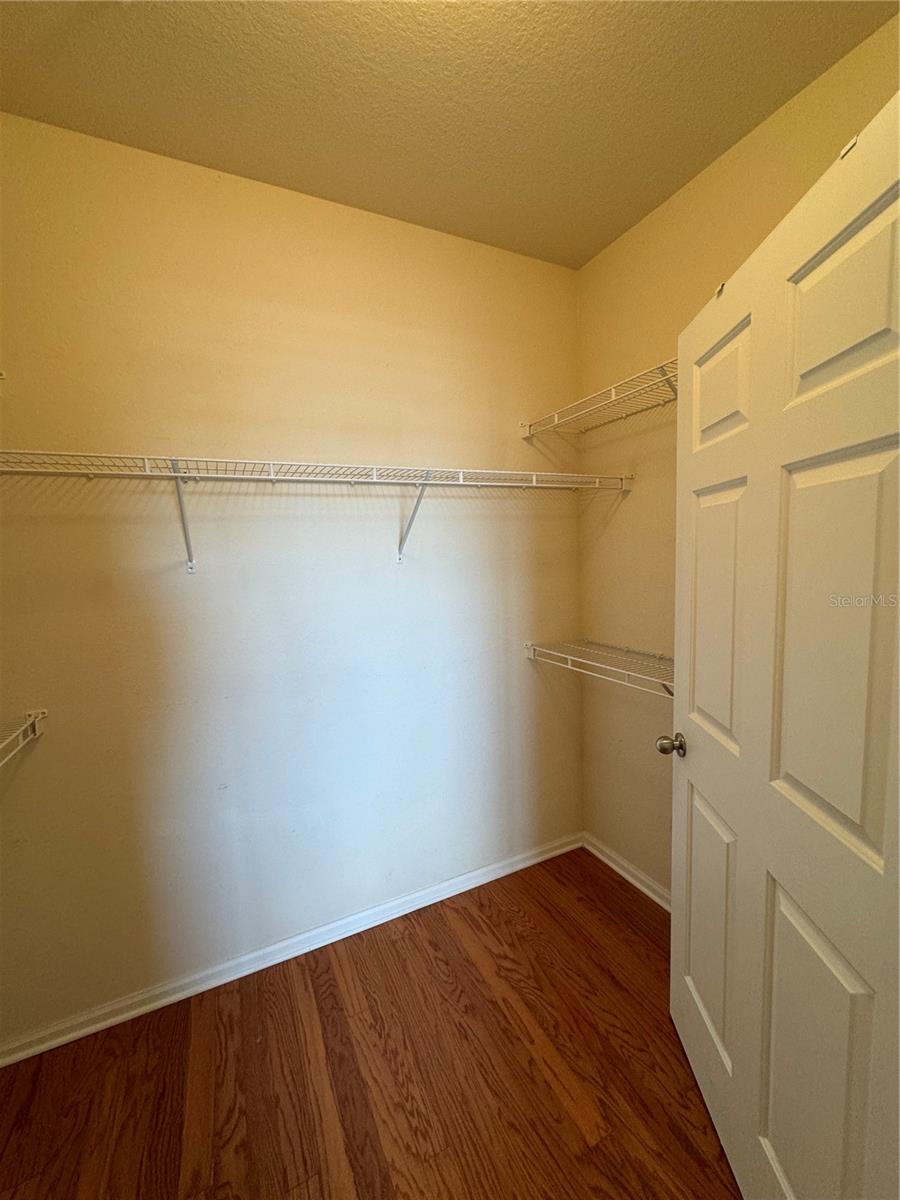 MAIN BEDROOM WALK-IN CLOSET