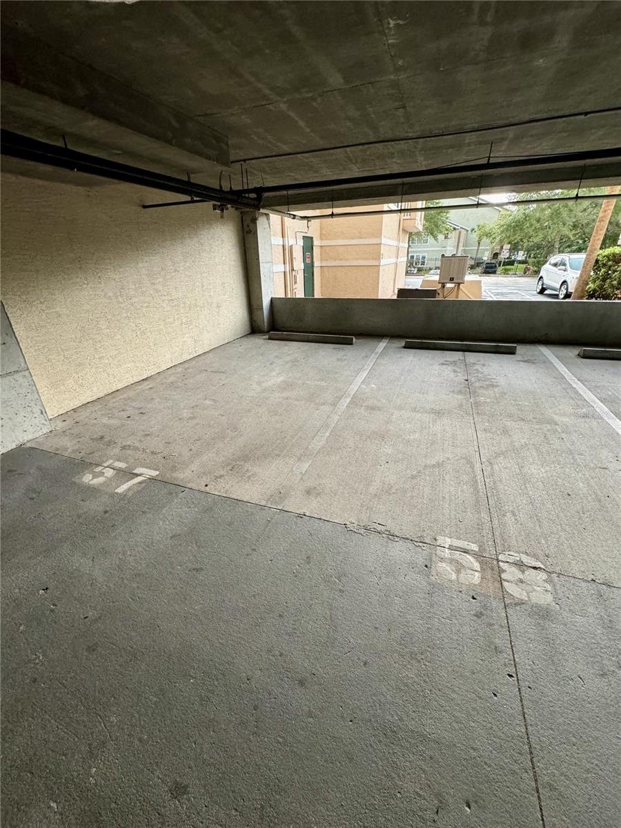 2 DEEDED GARAGE PARKING SPOTS