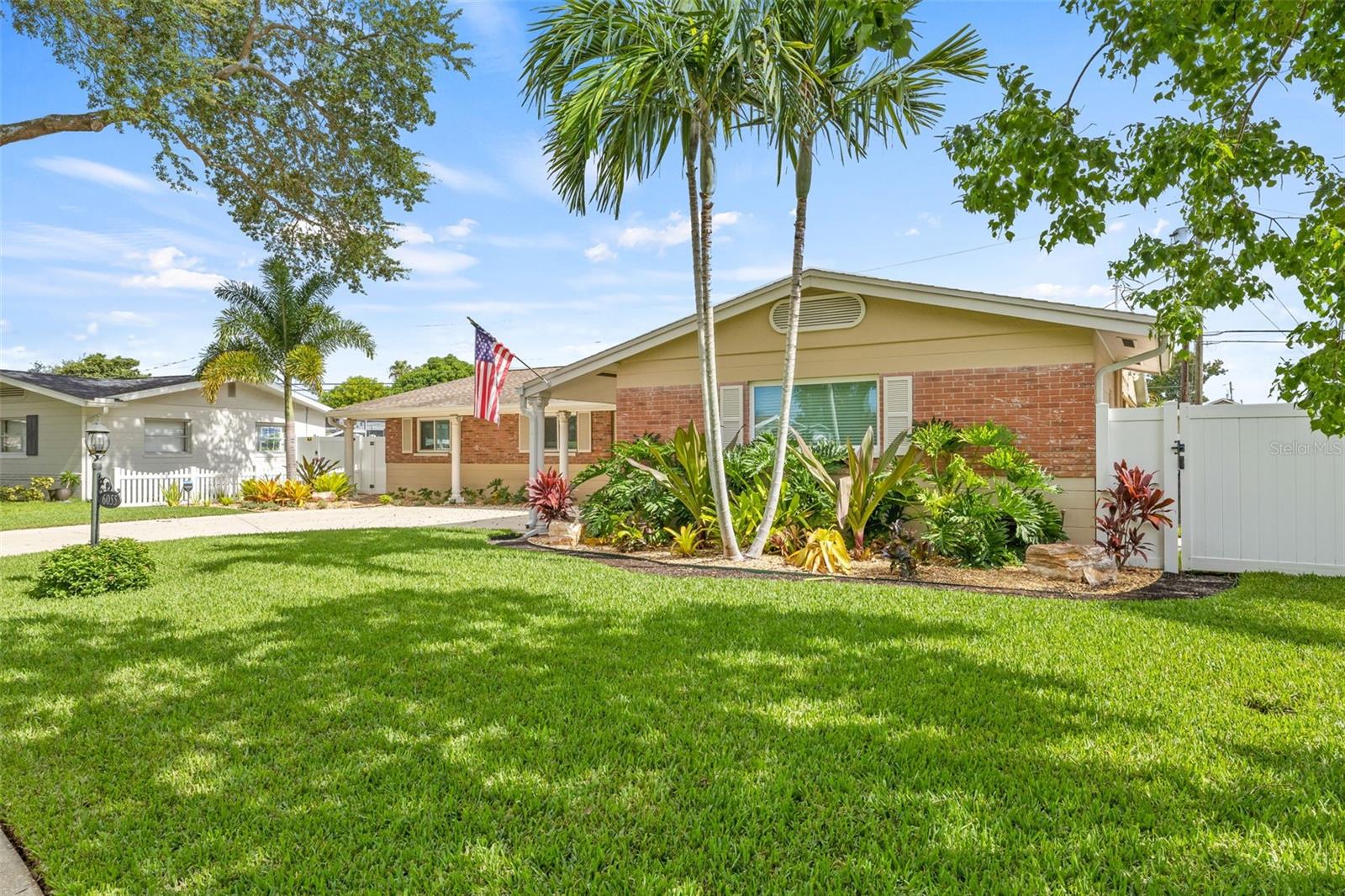 Beautifully landscaped and well manicured lawn.