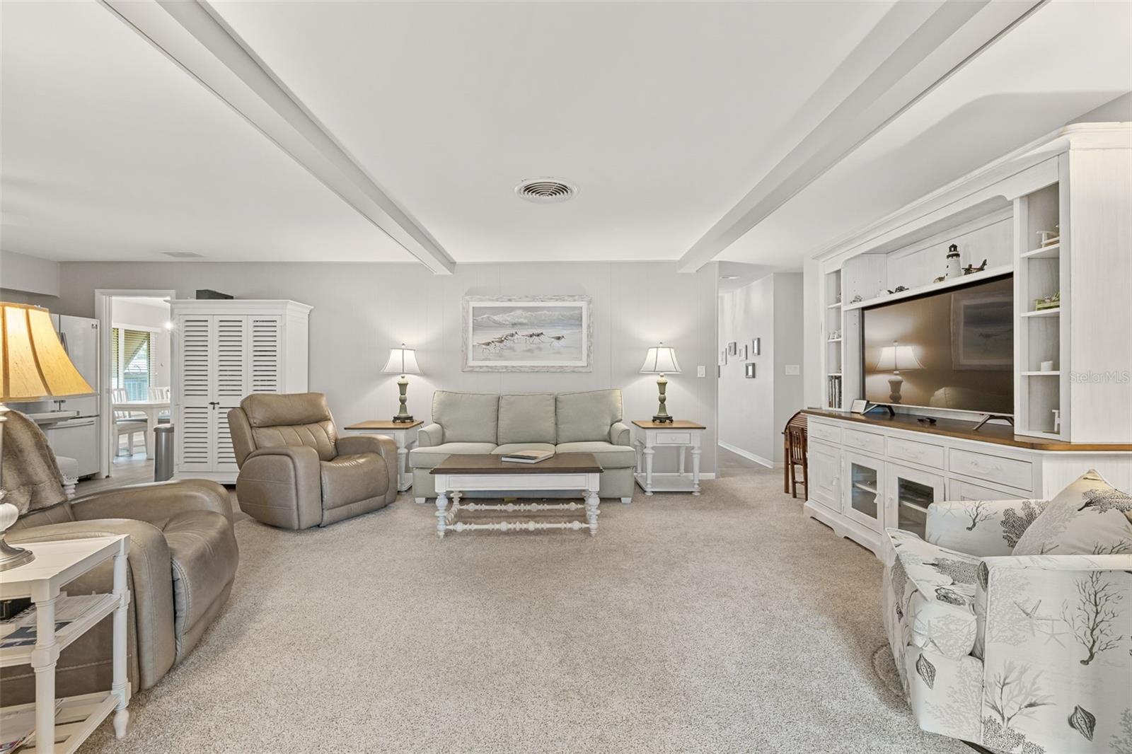 Living Room located off the Kitchen.