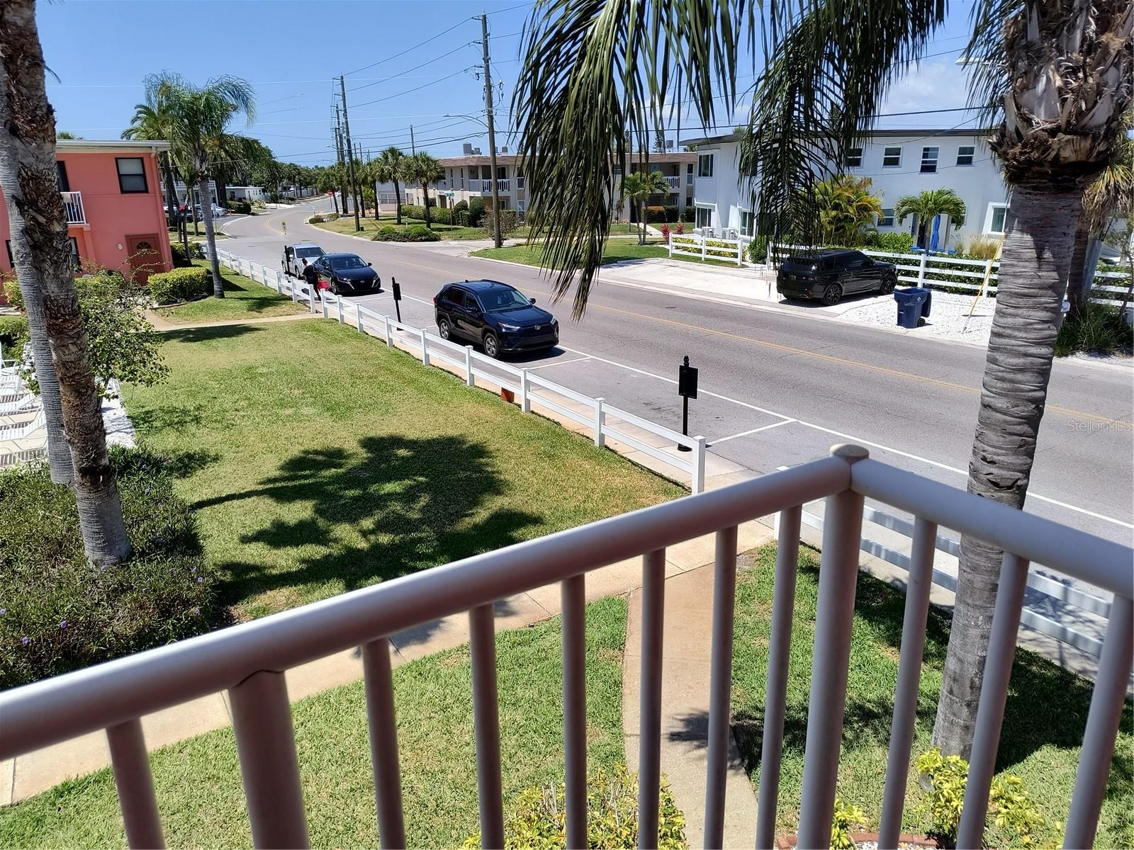 View from the balcony right with parking