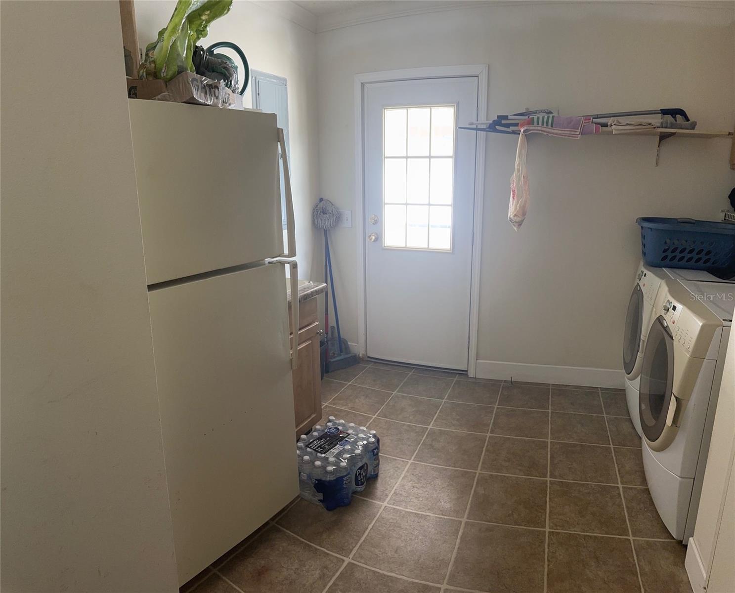 LAUNDRY ROOM, DOOR LEADING TO DECK