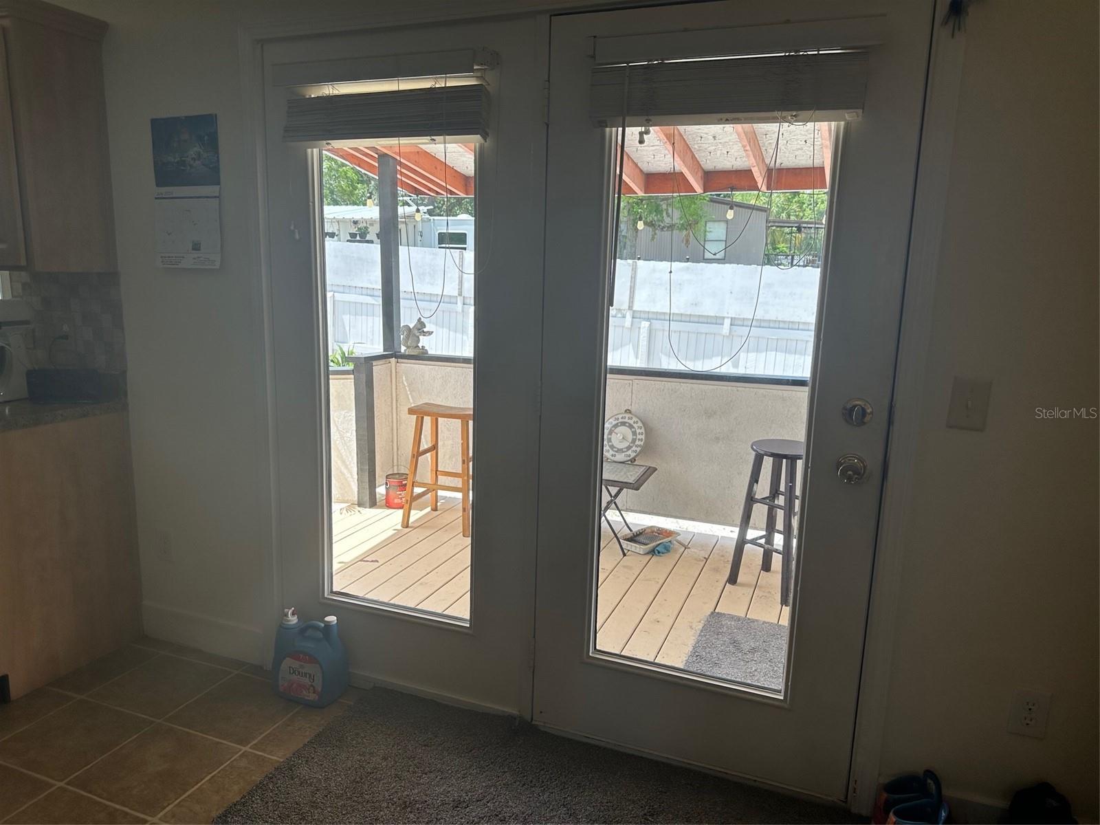 lOOKING OUT TO DECK FROM KITCHEN