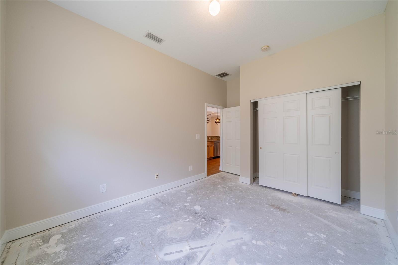 GUEST BEDROOM WITH BUILT-IN CLOSET