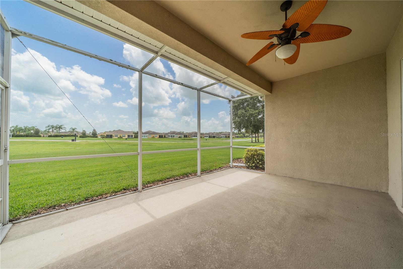 OVERSIZED SCREENED LANAI WITH A PANORAMIC VISTA