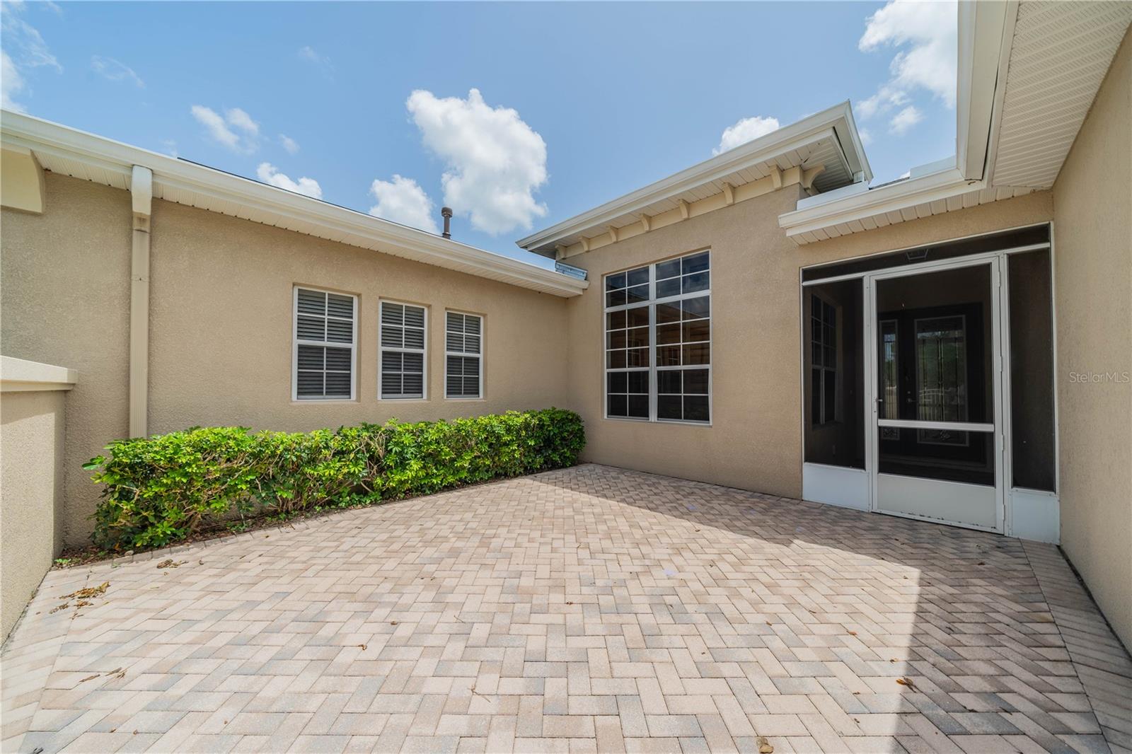 BRICK PAVER COURTYARD ENTRY