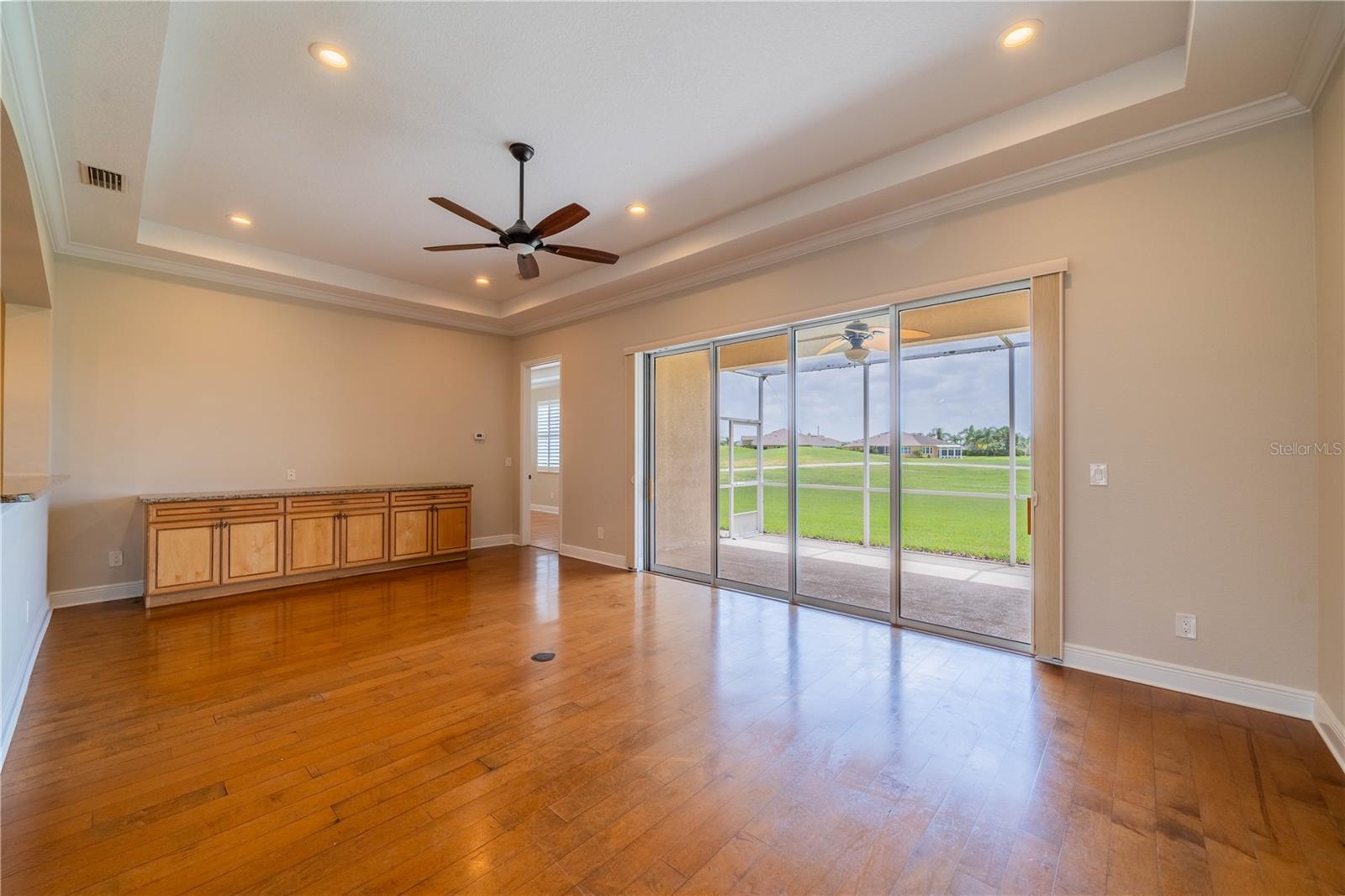 ENTRY INTO GREAT ROOM WITH BUILT IN CABINET