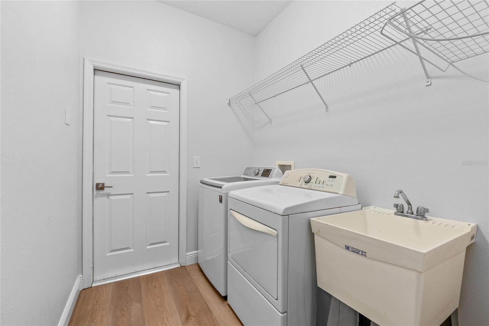 Laundry Room with Utility Sink & Storage Shelving