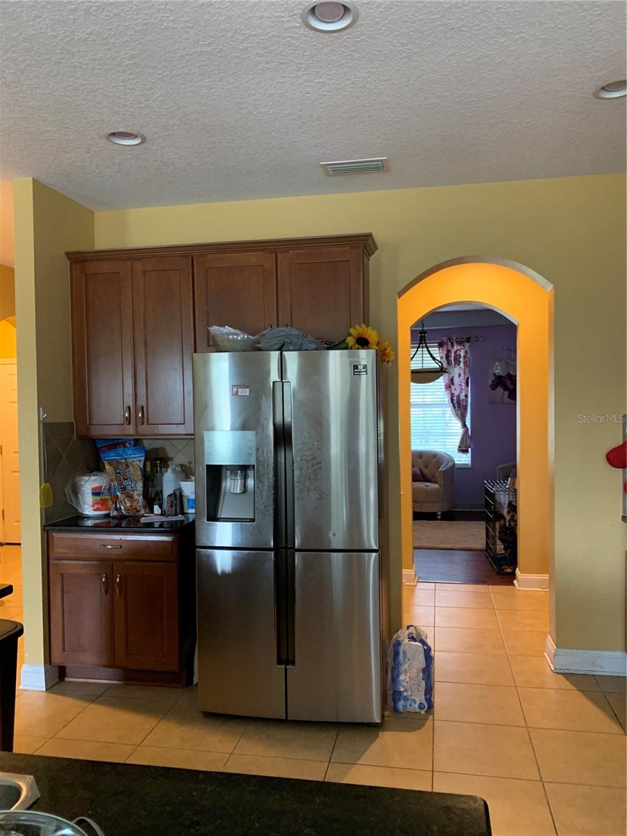 Kitchen looking through to living room/office