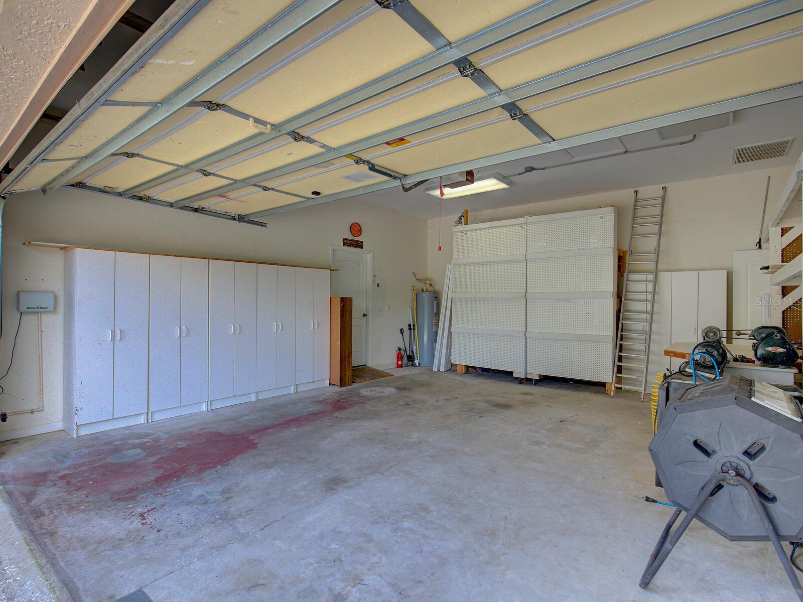 Separate two car garage with built ins.