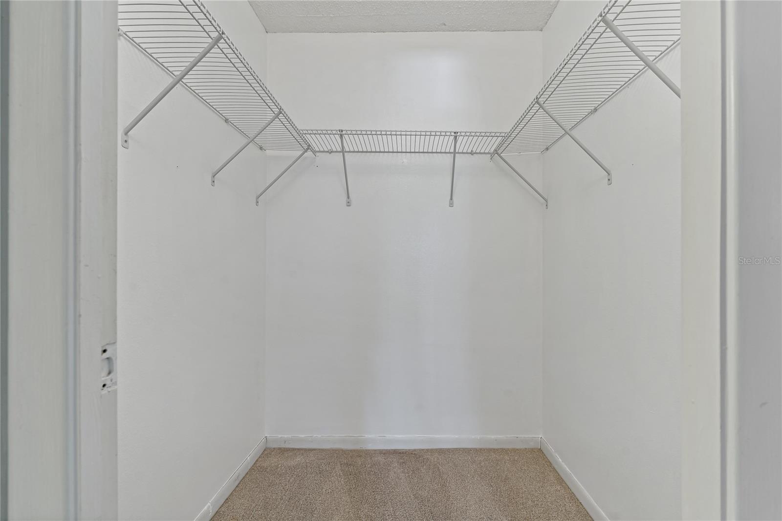 Walk-in Closet in primary bedroom