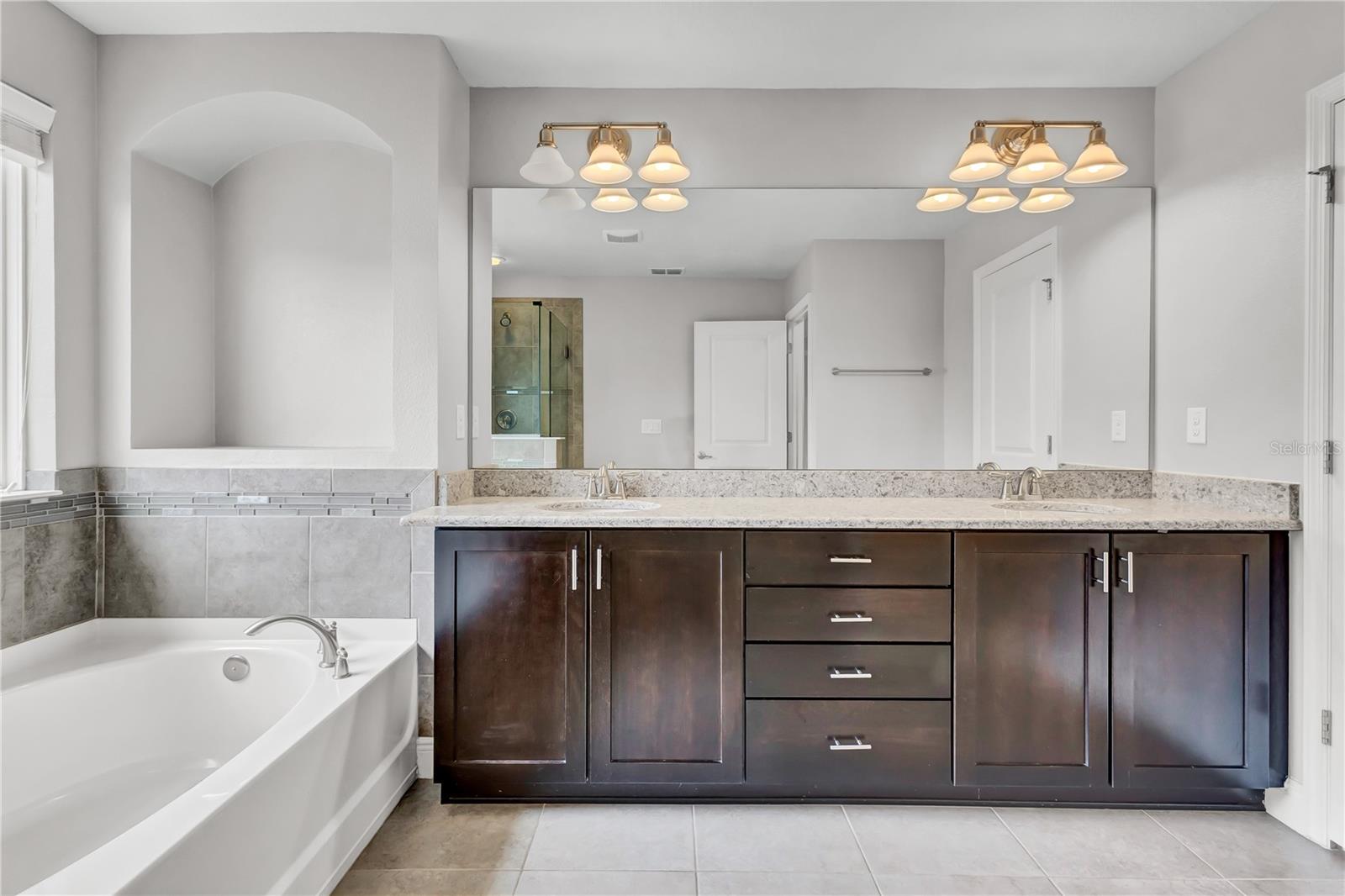 Master Bathroom with Dual Sinks and Build in Shelving~