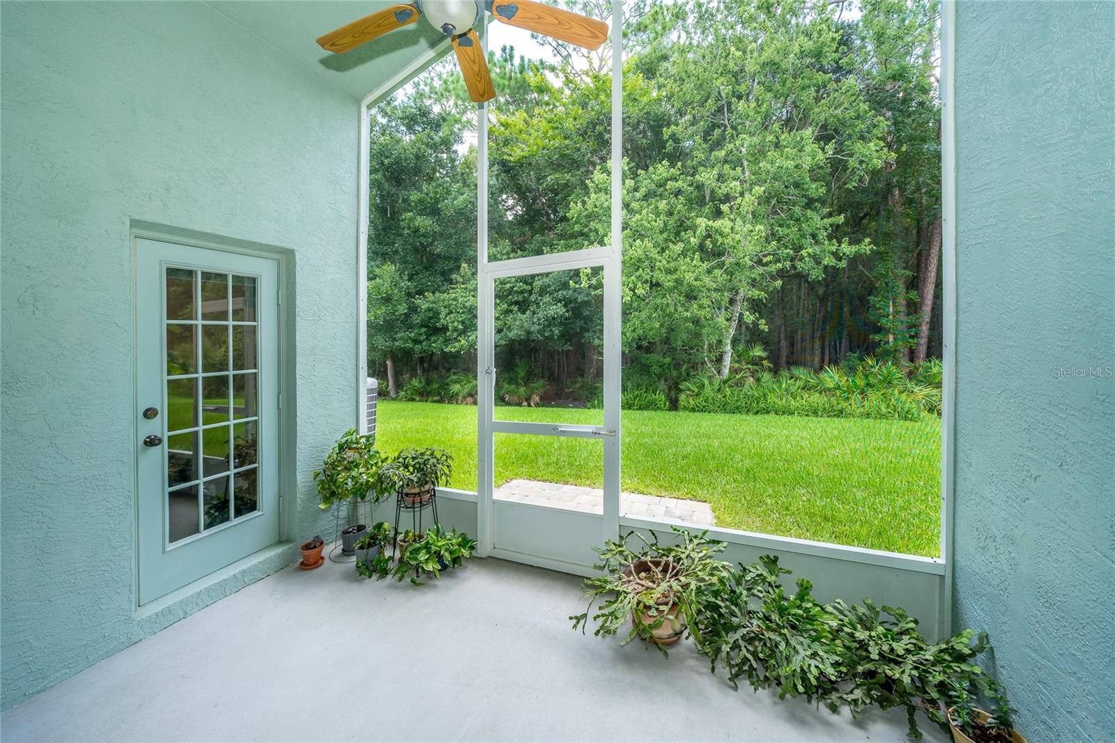 Screened lanai offering privacy - facing East