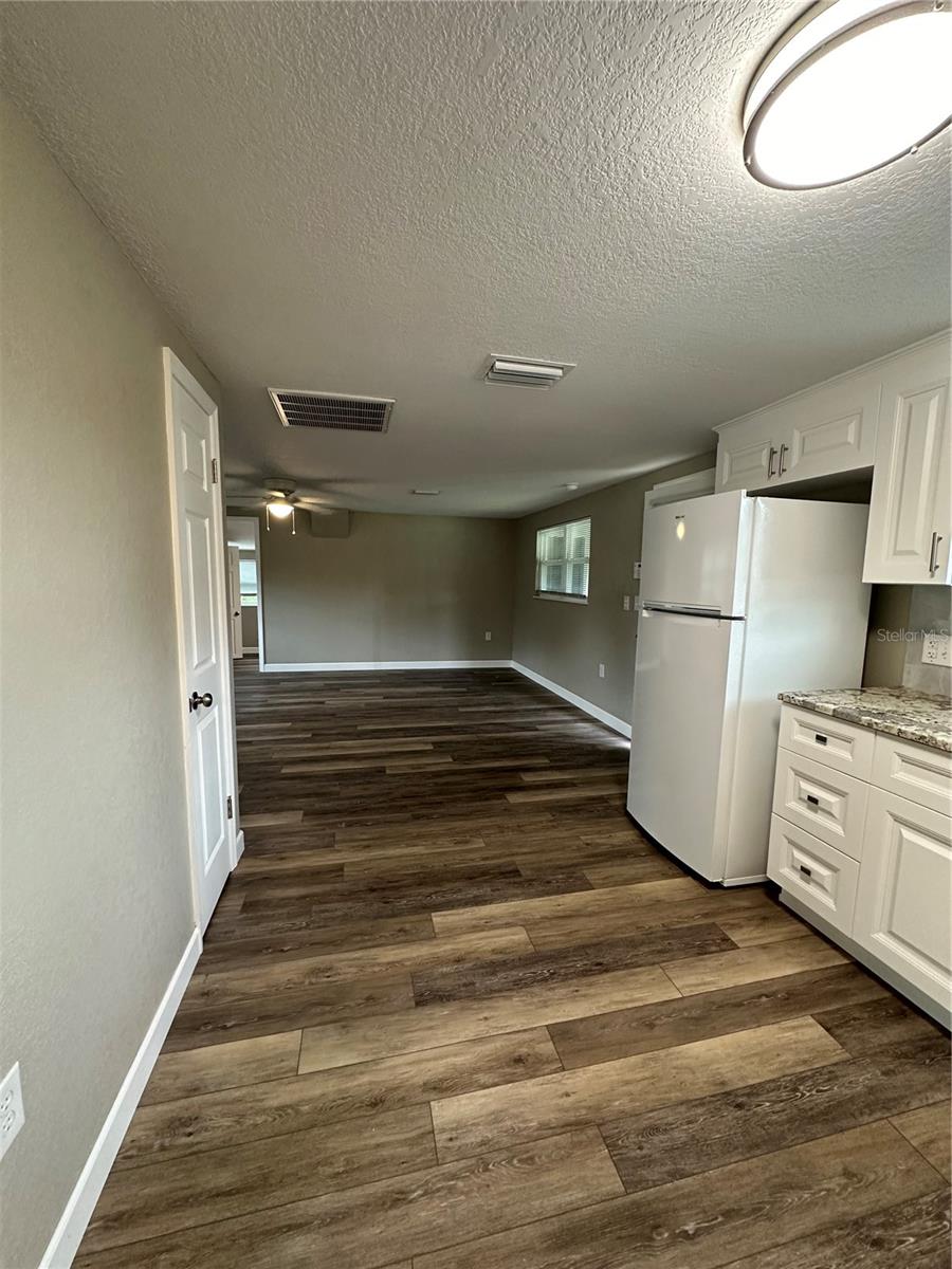 Upper unit kitchen looking into living room