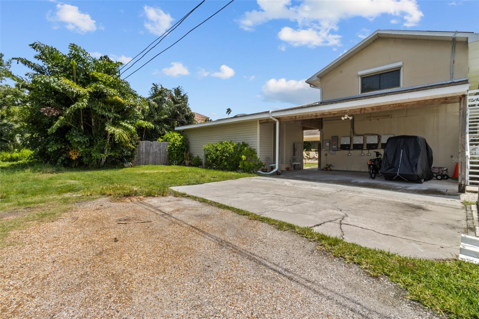 BACK OF HOME EXTERIOR & CAR PORT