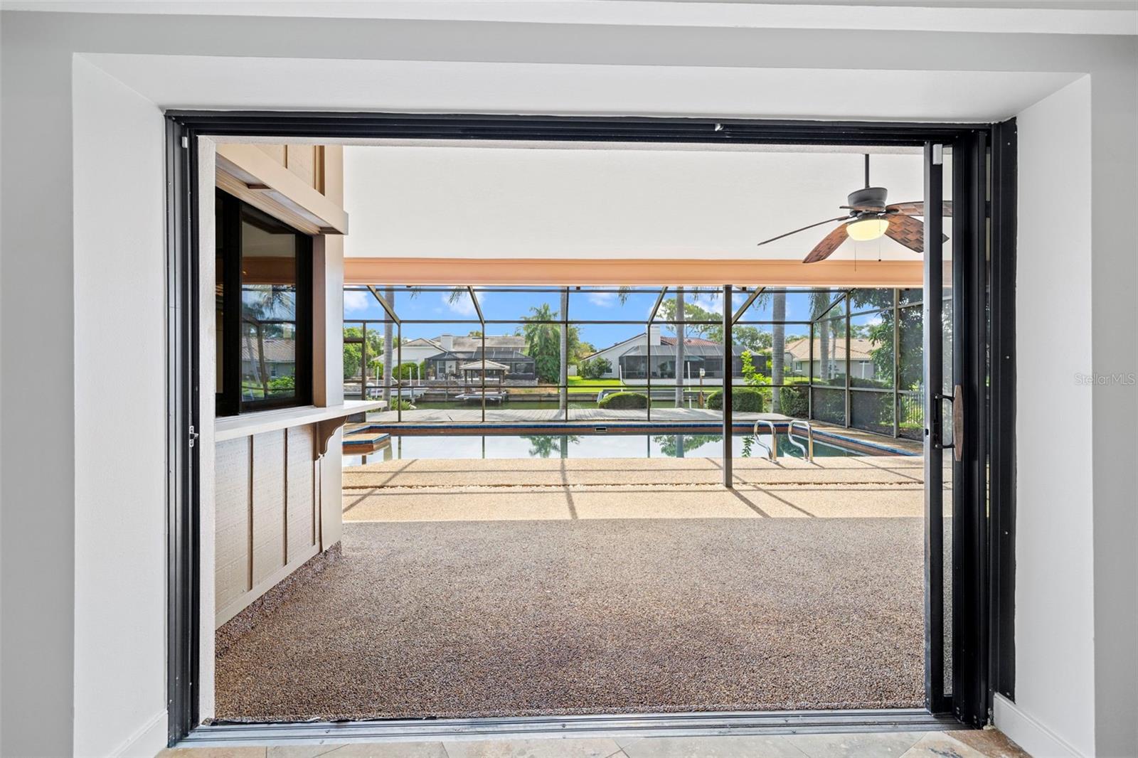 View to the pool and outside