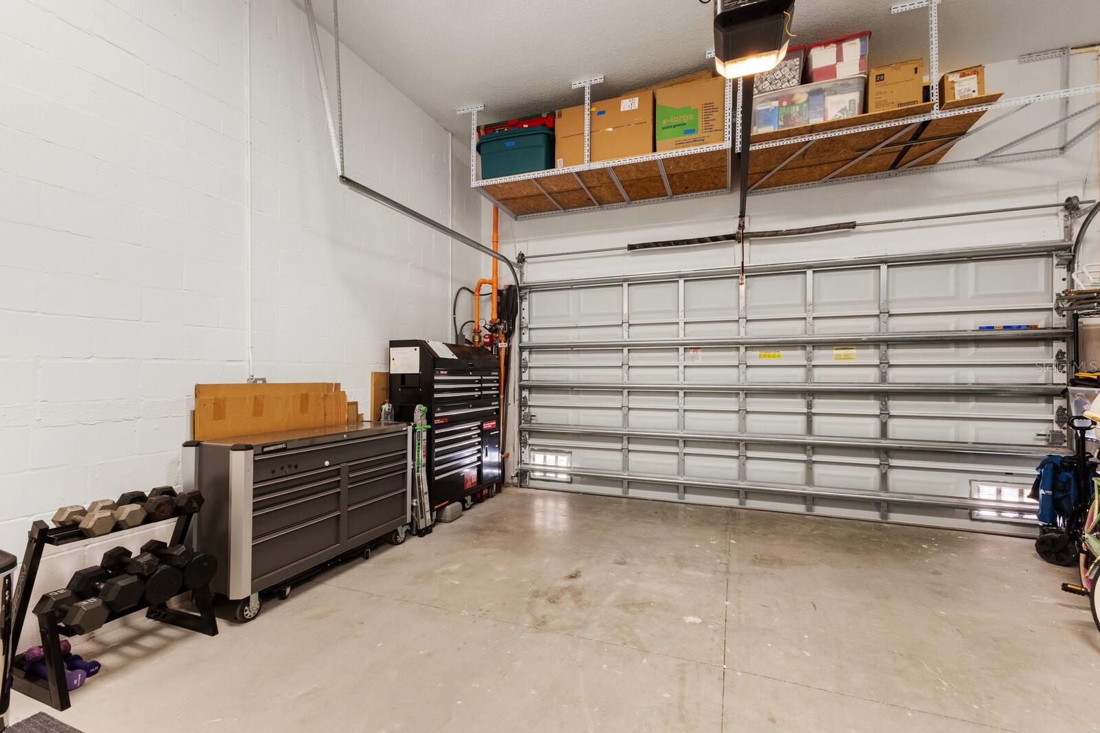 Huge garage with storage shelves