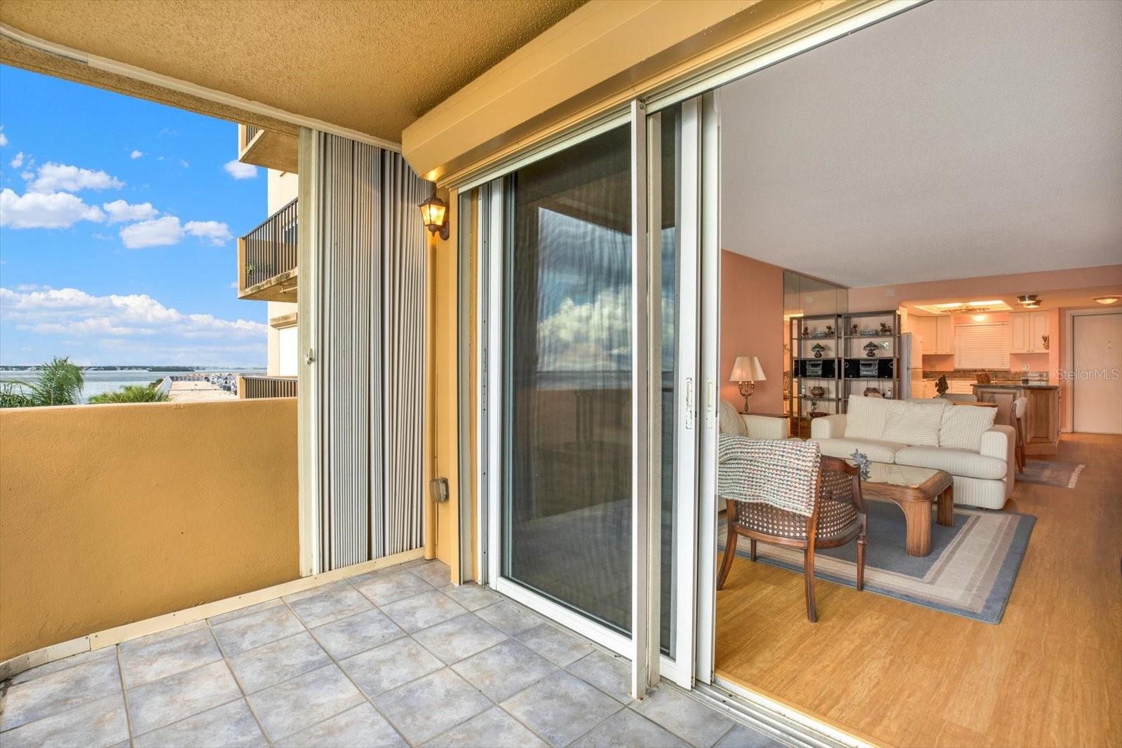 Hurricane Shutters on balcony doors and all windows throughout the Unit