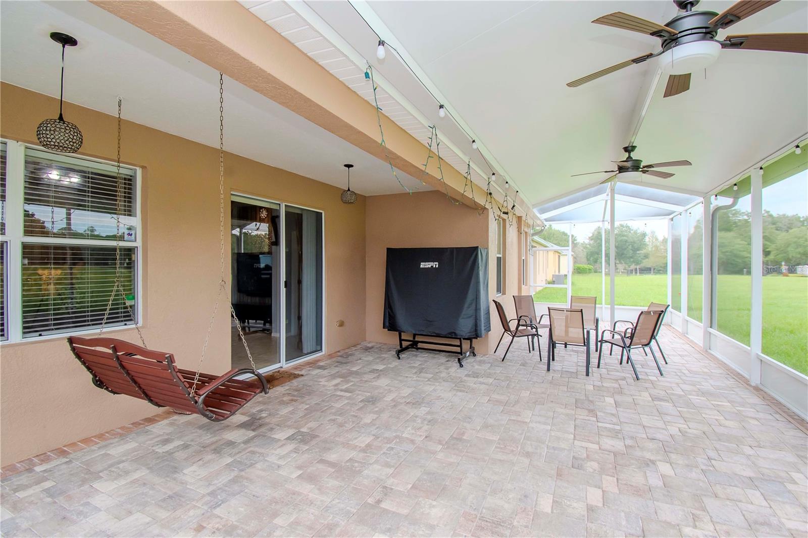 Very spacious screened-in back patio