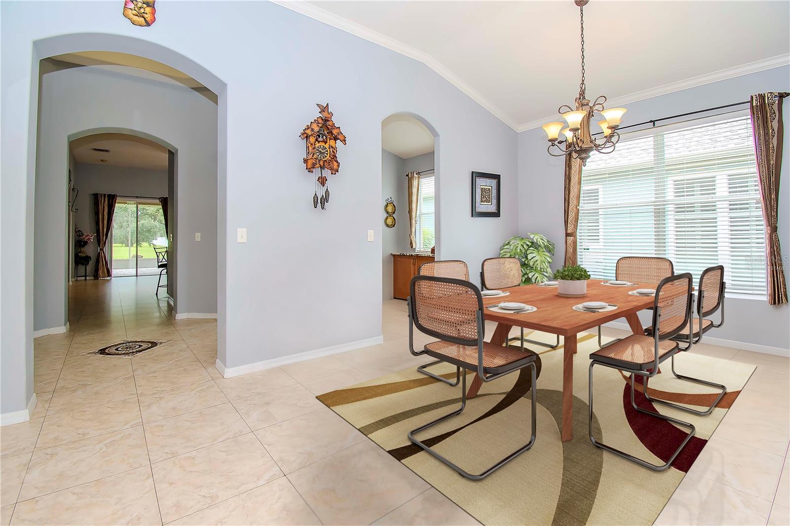 Virtually staged dining area/foyer