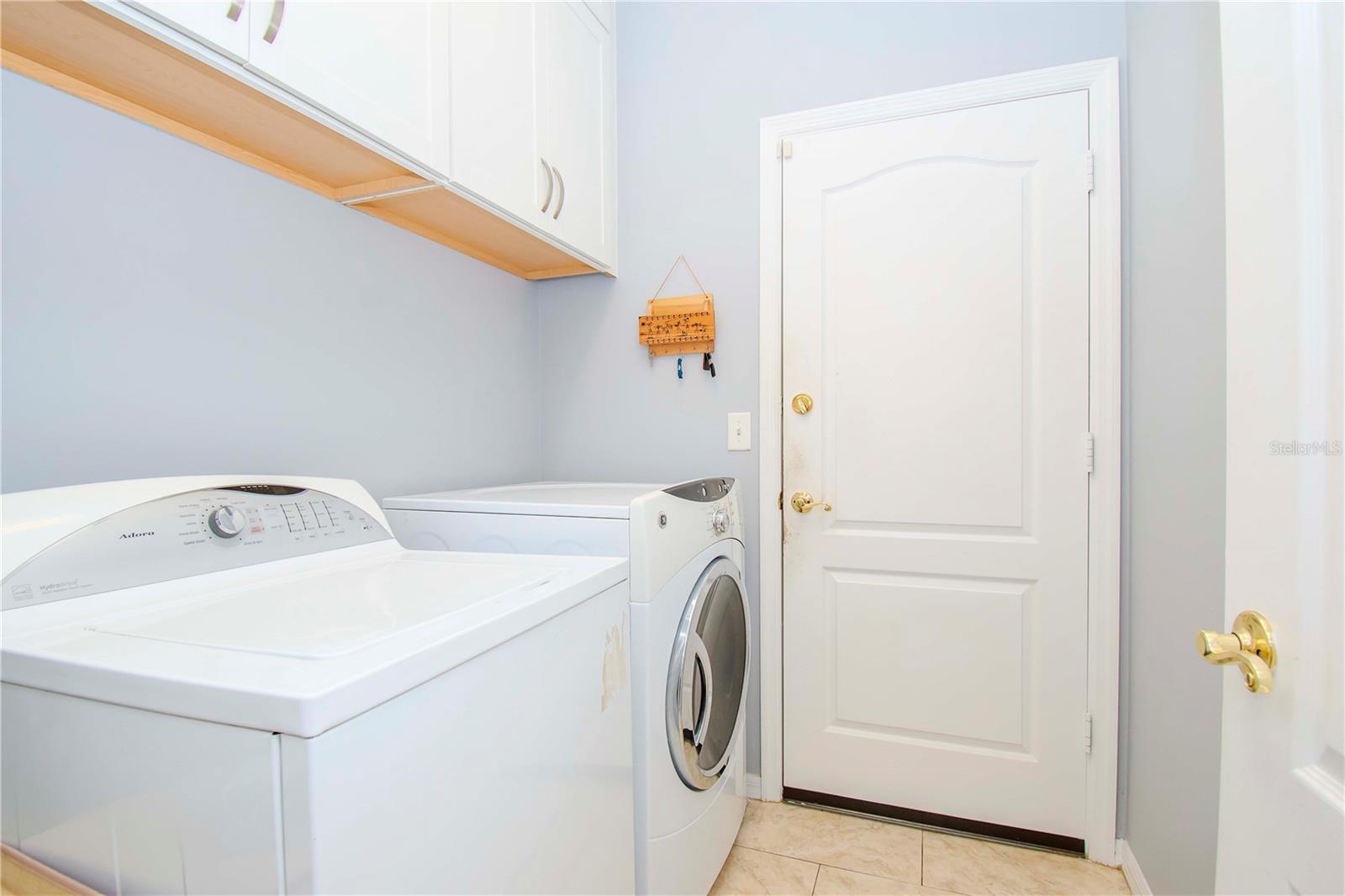 Laundry room with artificial skylight