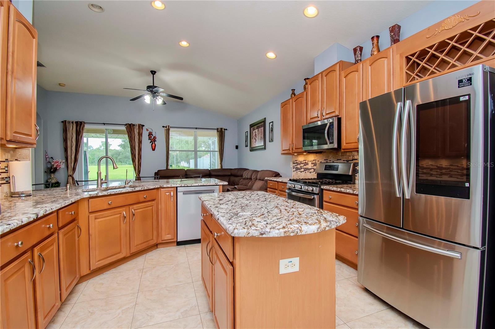 Kitchen with gas cooking and breakfast bar