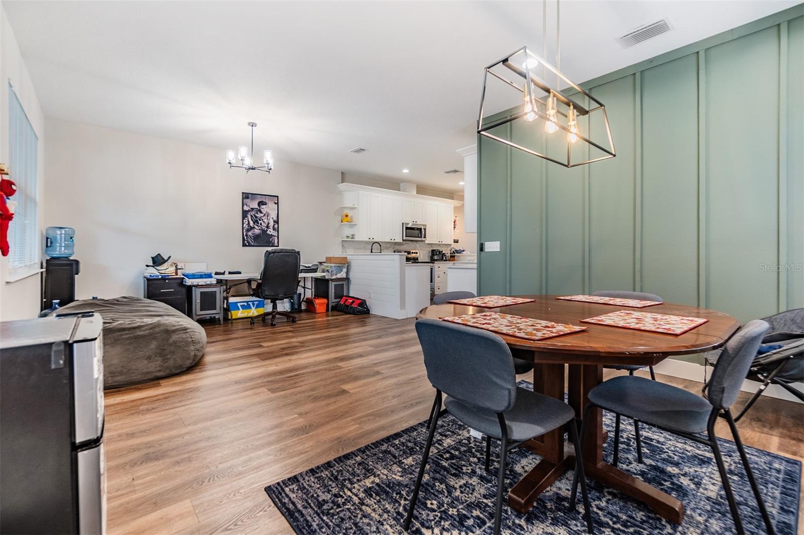 Formal dining room and Living room, accent wall and updated fixtures.