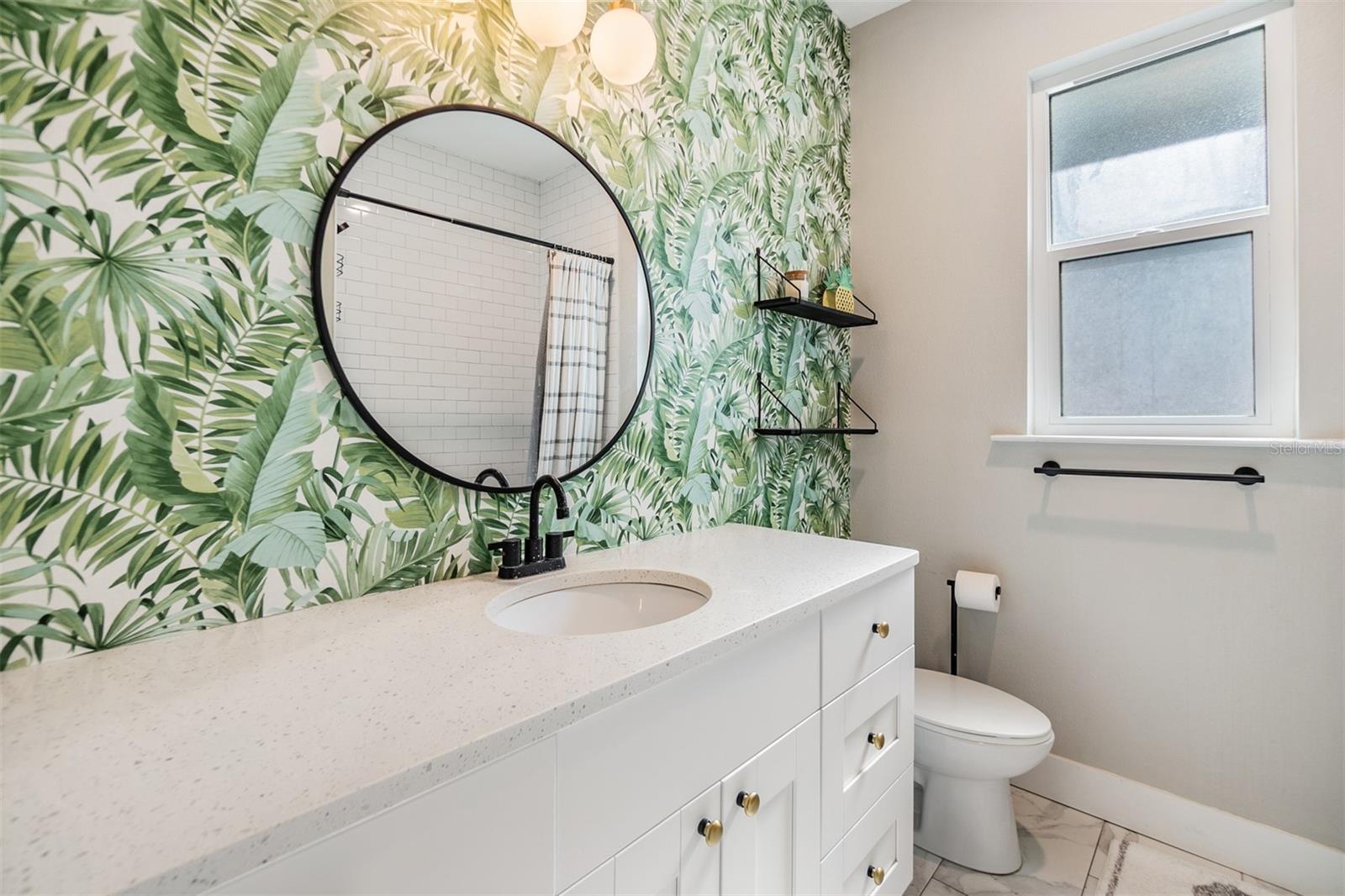 Guest Bathroom, updated countertop and light fixture.