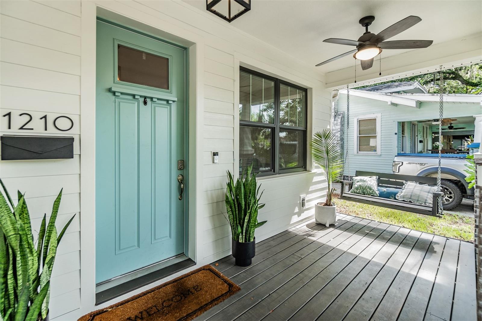 Front entry - nice front porch with lights and ceiling fan