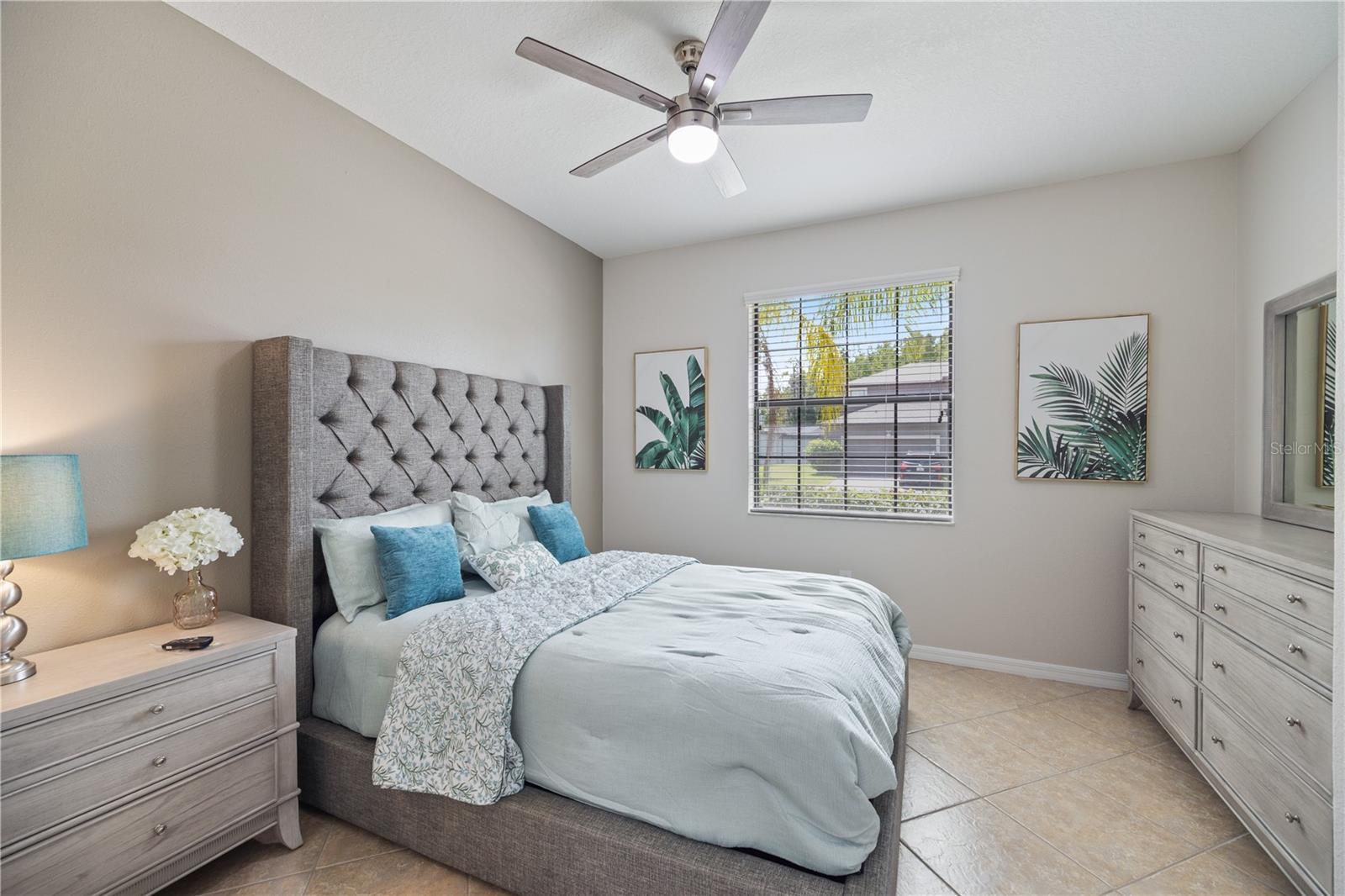 Bedroom one with ample space for a Kingsize bed (Shown is a queen), New ceiling fan