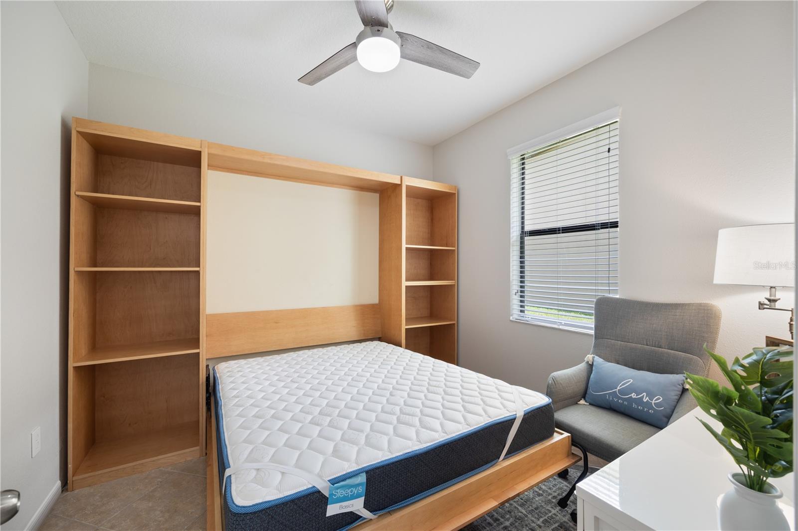 Queen Murphy bed easily folds out with space to move around