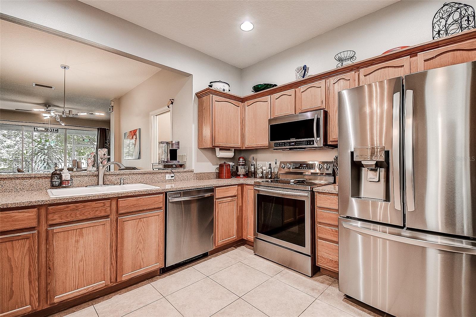 Large kitchen loaded with cabinets and breakfast nook.