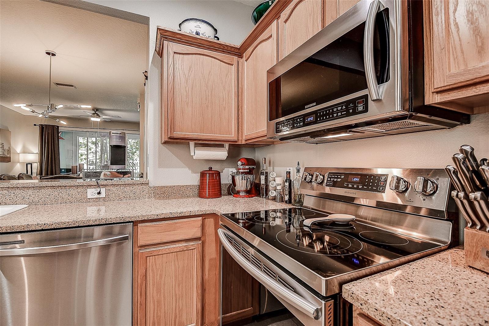 Kitchen with newer stainless appliances.