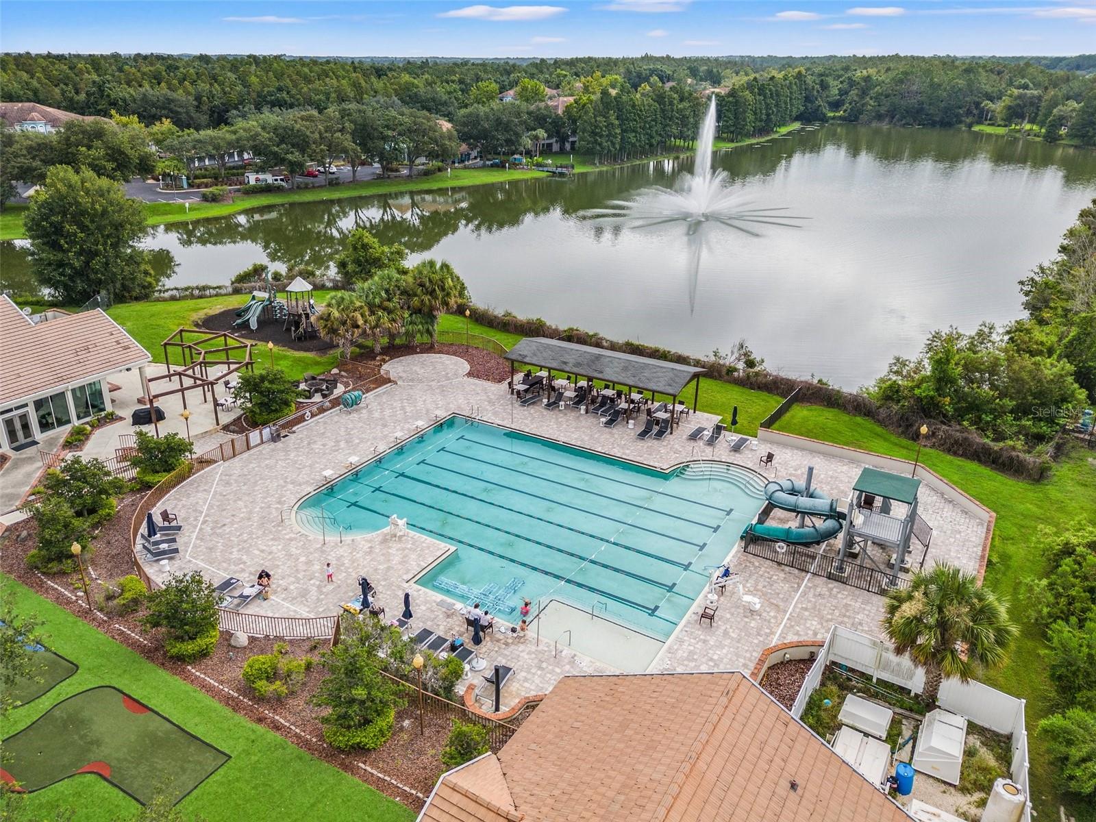 Country Club lap pool with a slide for the kids