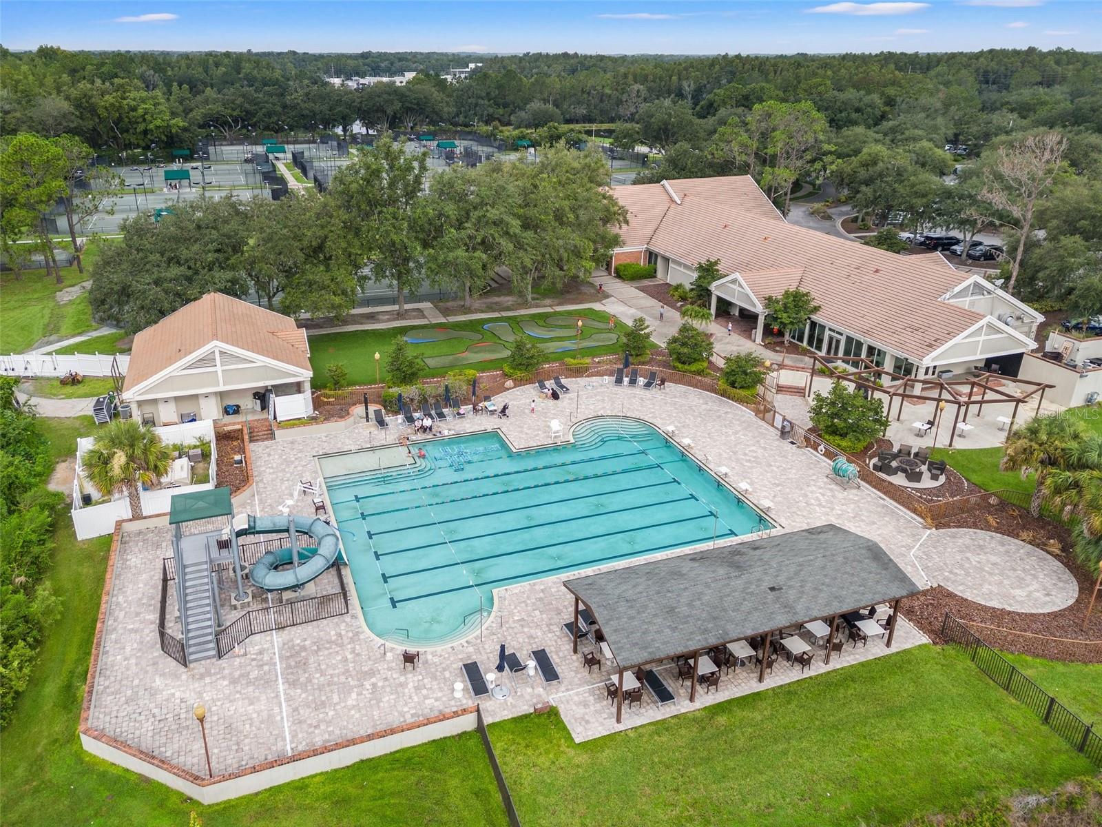 Country Club lap pool with a slide for the kids