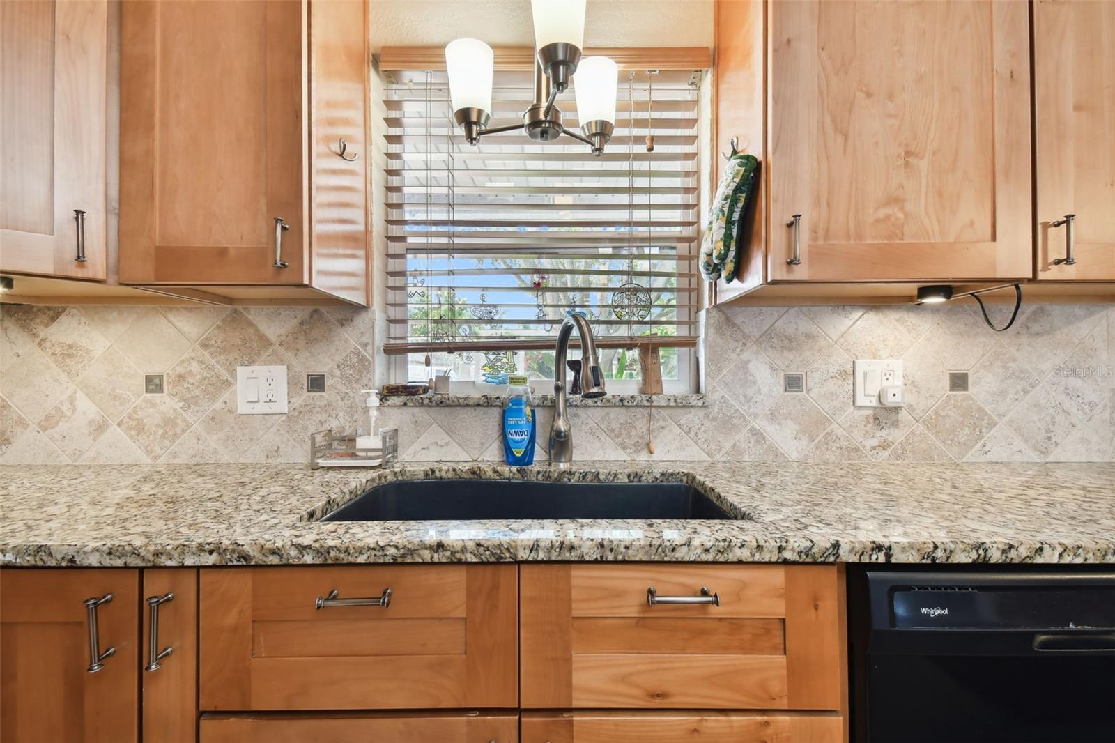 Always great to have a window at your kitchen sink while you daydream when washing dishes. Farmer's sink