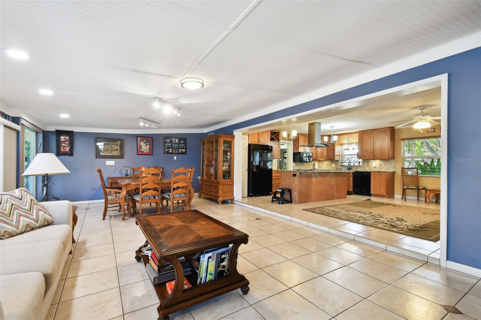 Ceramic tiled floors throughout, inset lighting, fans, neutral colors