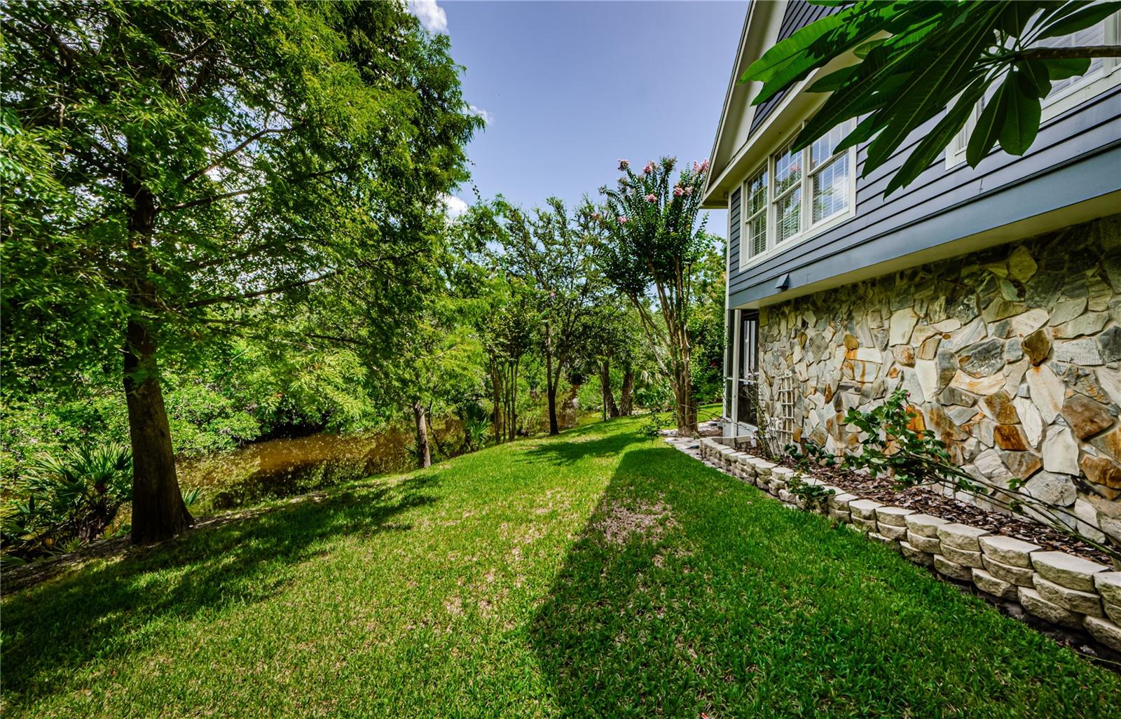 Look hard beyond side of house to see the water of Curlew Creek.  Kayak, Canoe, Paddle Board, or fish for Snook or Mullet.