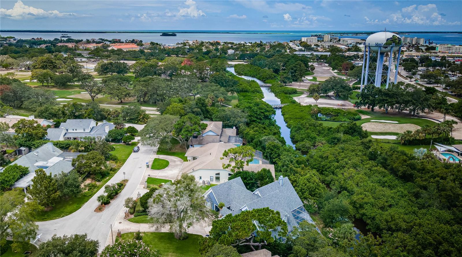 Here you see behind this Cape Cod style home, Curlew Creek running all the way out to the inter-coastal and ocean beyond.  You can Kayak, Canoe or Paddle Board all the way out!