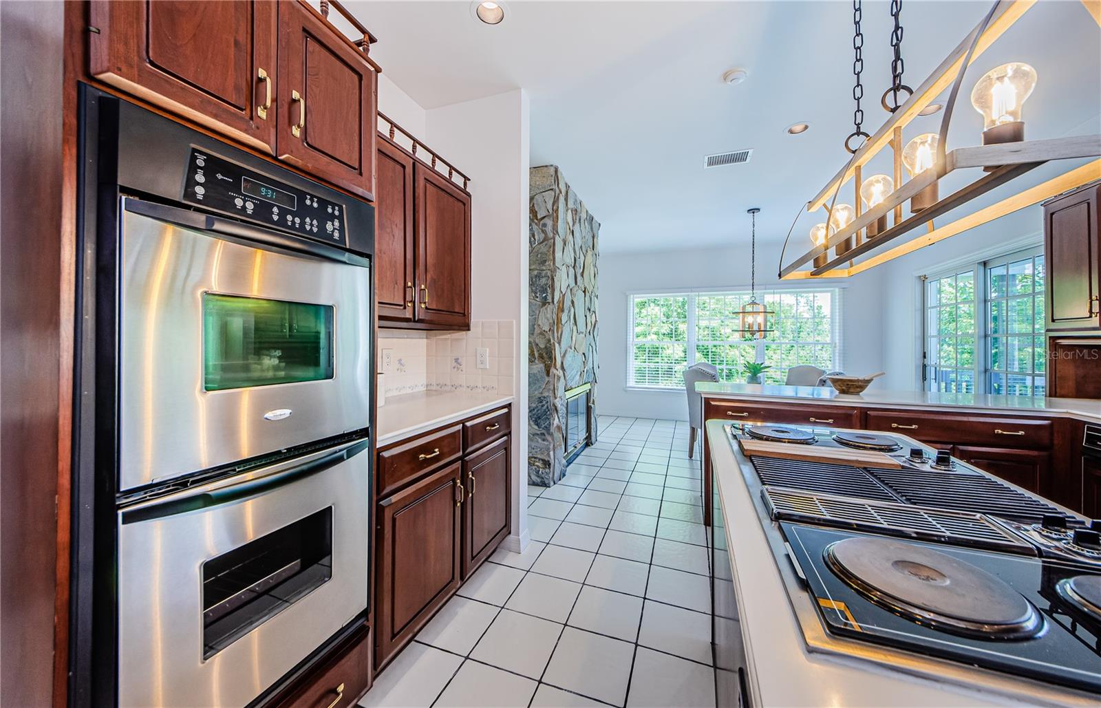 Double oven, Jenn-air grill and electric stove top.  Seller will give allowance for new one.