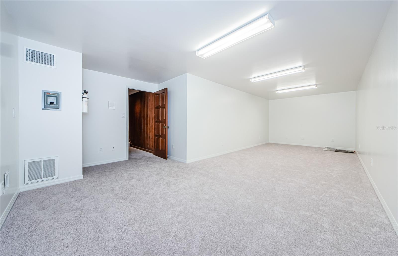 Large bonus room, all new paint, new carpet and padding. Could be media room, studio, etc.