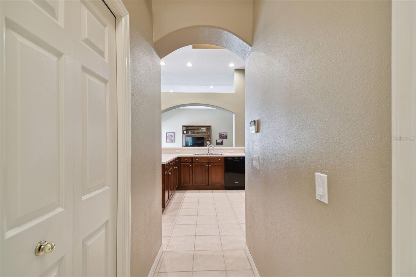 HALLWAY TO PANTRY AND LAUNDRY ROOM