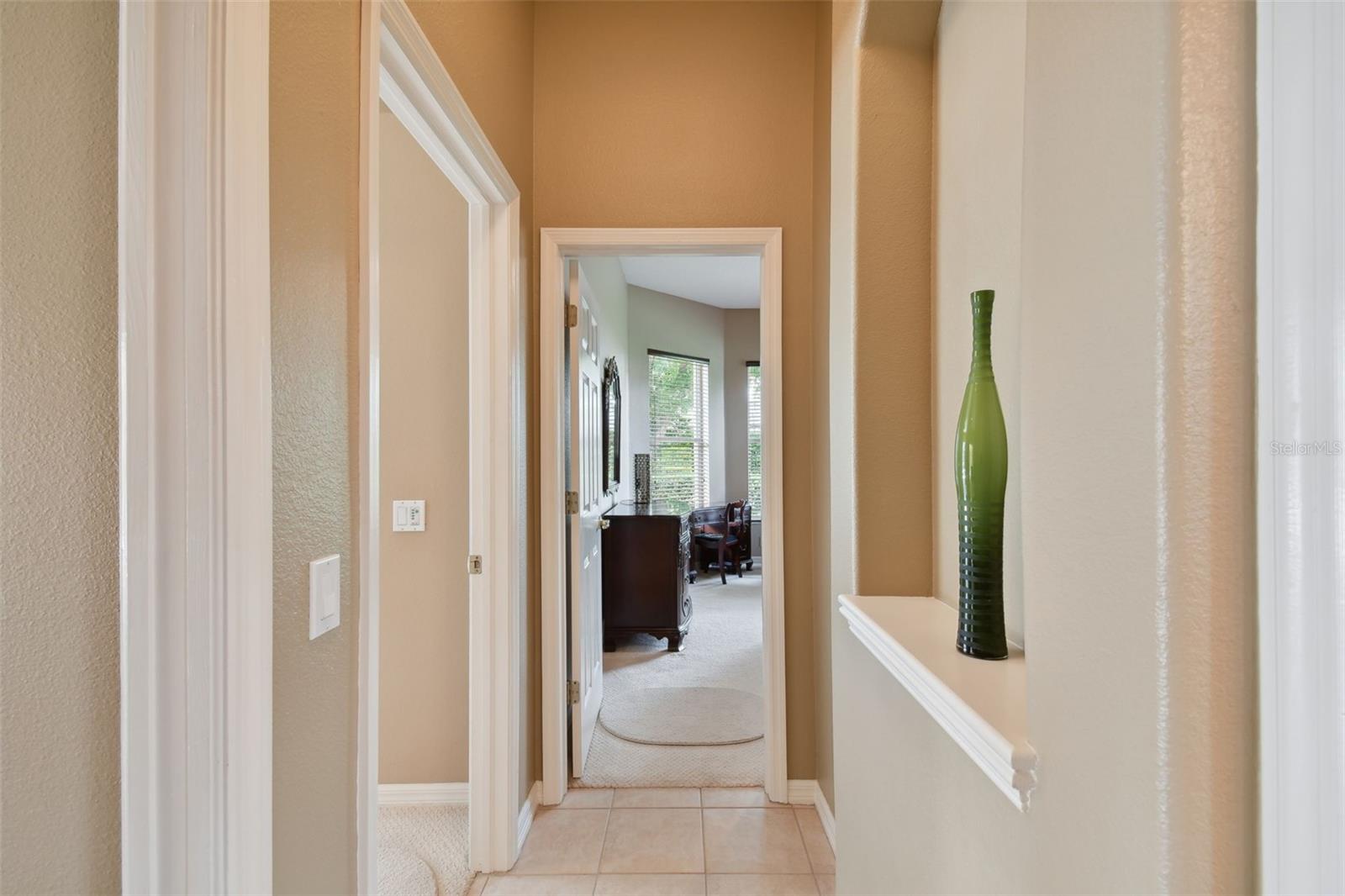 HALLWAY TO BEDROOM #4 AND THE BONUS ROOM