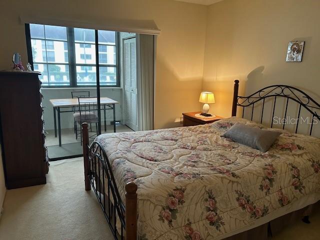 Master Bedroom with large walk in closet & private patio