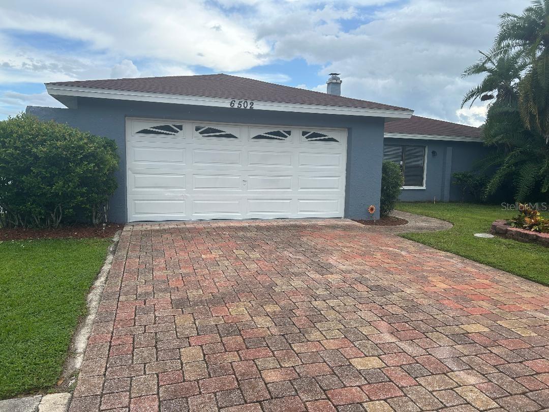 Paved driveway, 2 car garage