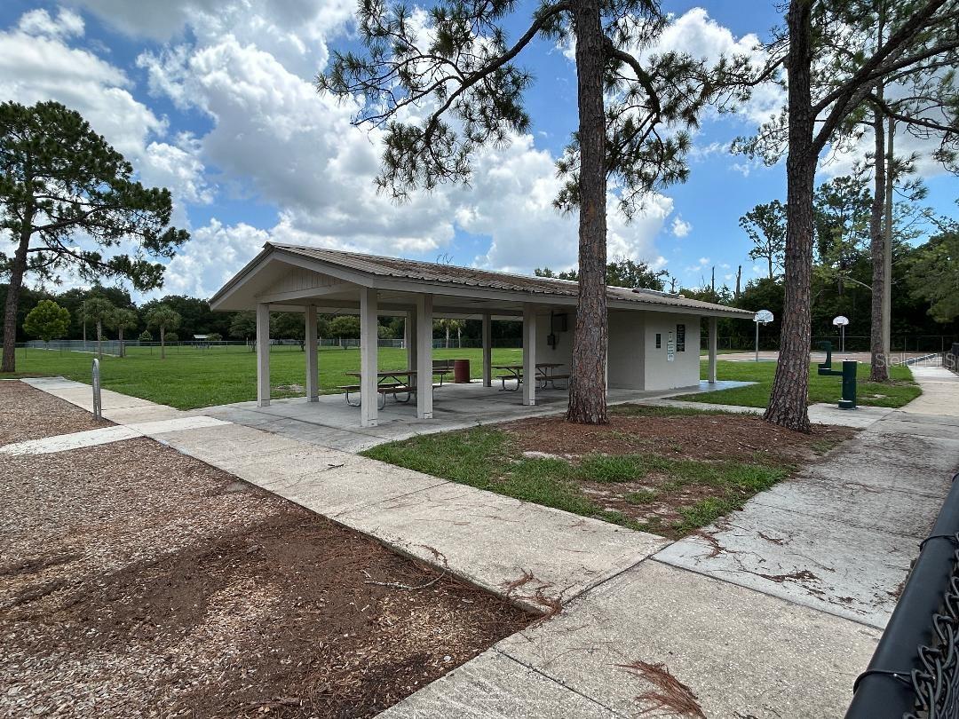 Covered area with seating at playground