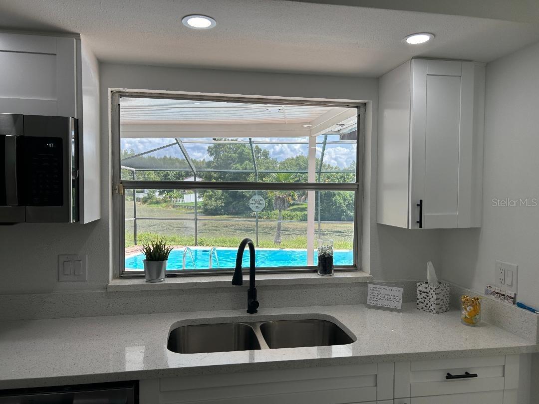 View of pool/pond from kitchen