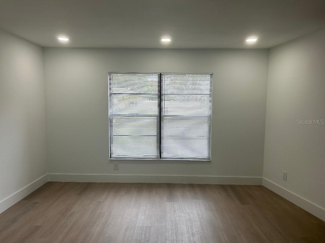 Living area at entry has fireplace, super bright