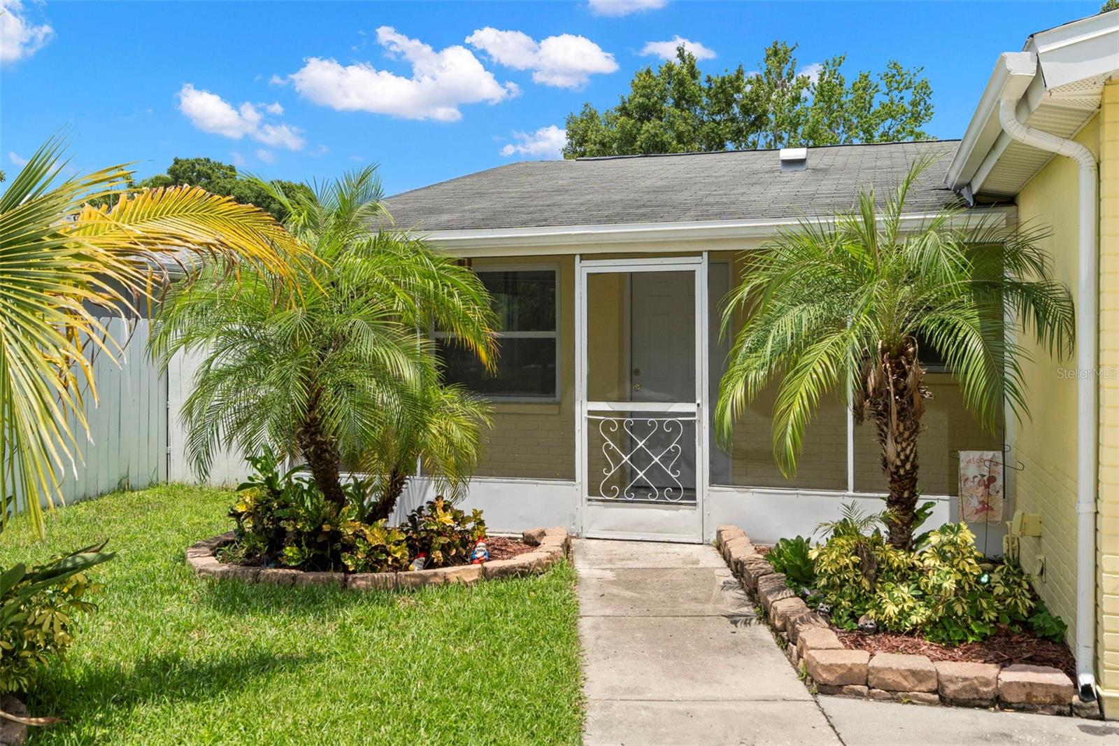 Enter through your screened front porch into your living room