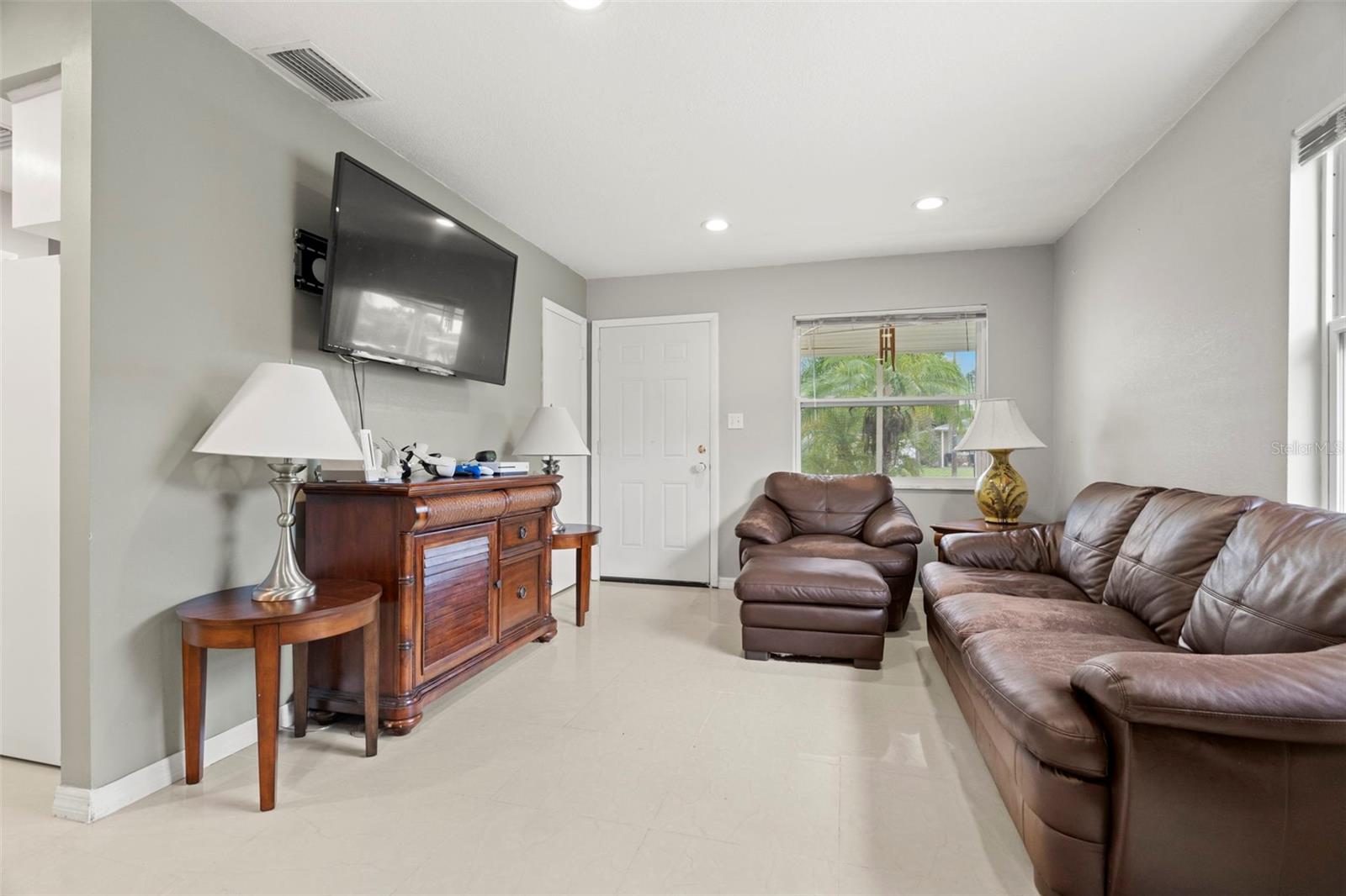 Living room facing the screened entry